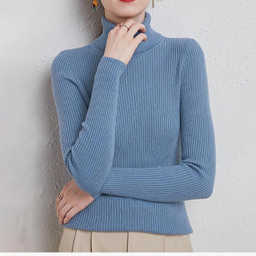 Blue ribbed turtleneck sweater